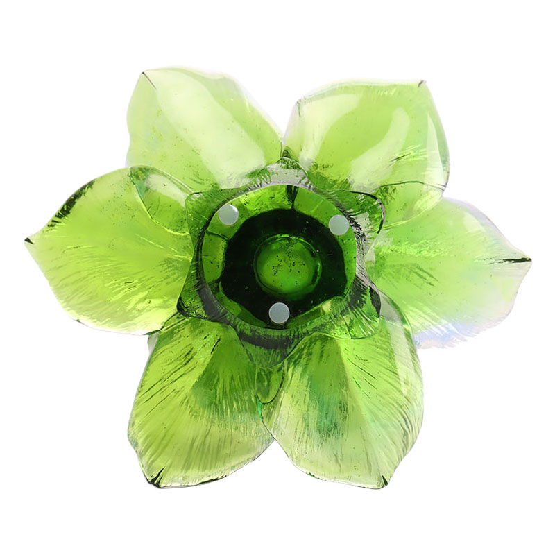 Szklany świecznik w kształcie płatka