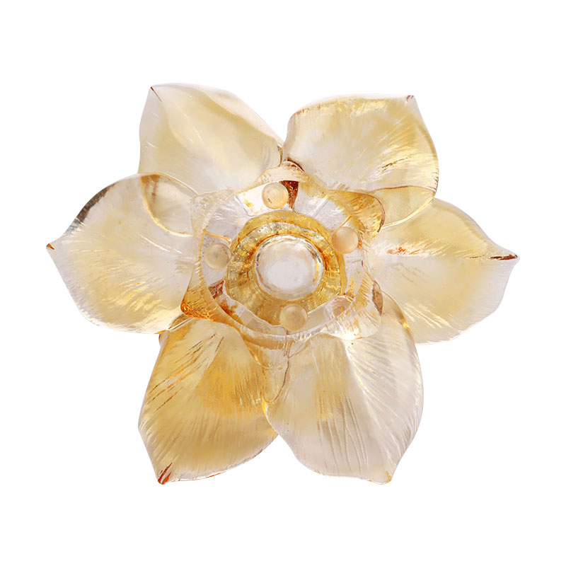 Szklany świecznik w kształcie płatka