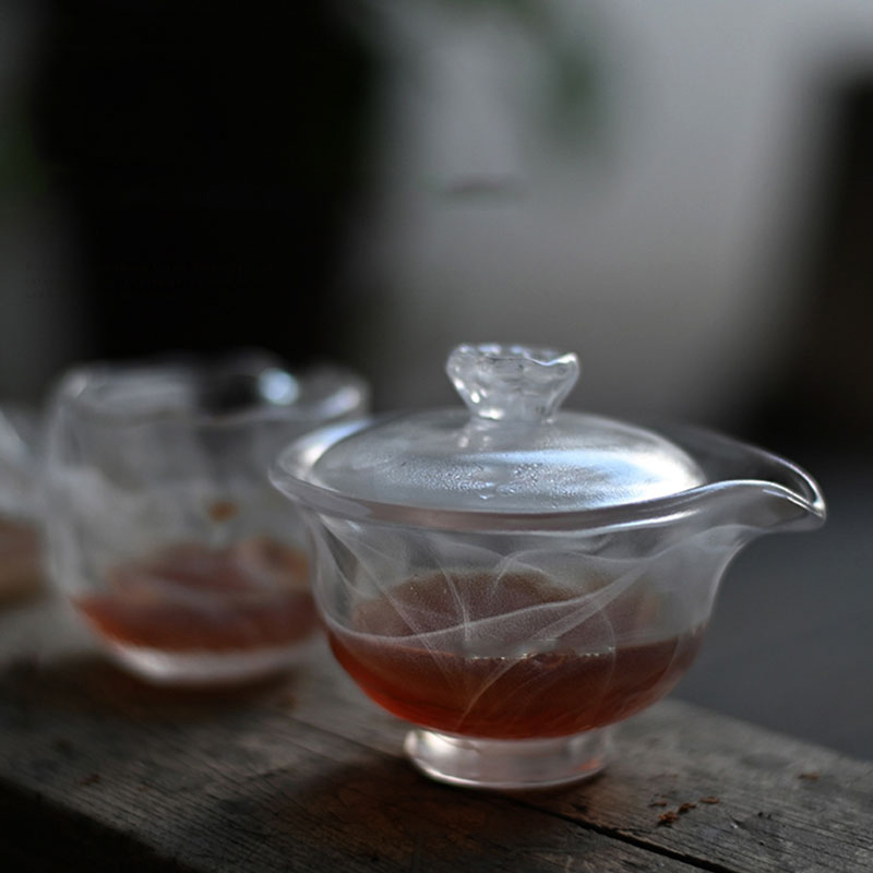 Przezroczysty szklany zestaw do herbaty z czajniczkiem i filiżanką herbaty